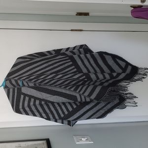 Striped black and grey poncho